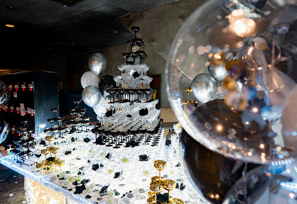 Special champagne tower and balloons in gorgeous clear, black and gold colors